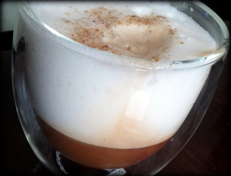 Frothed almond milk cappuccino in Bodum mug